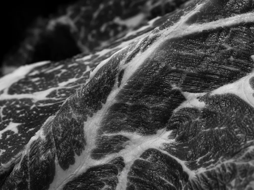Macro texture of grass-fed beef marbling
